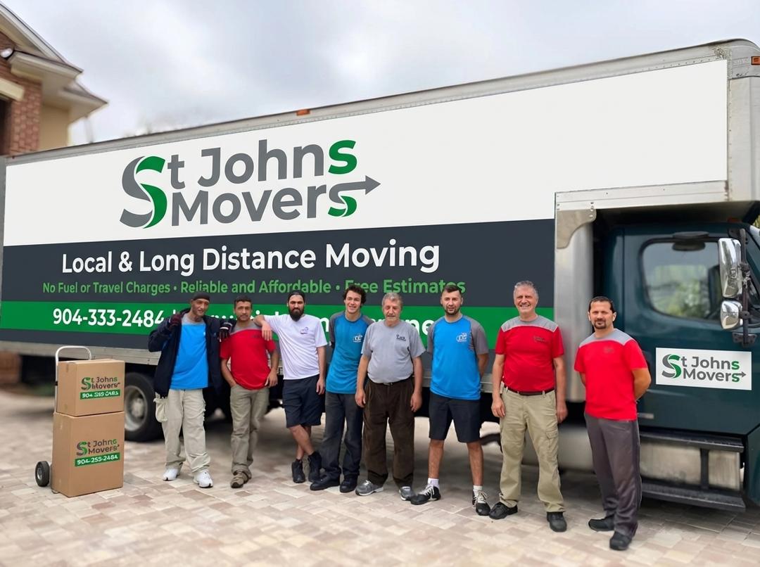 Movers packing an antique in a custom crate